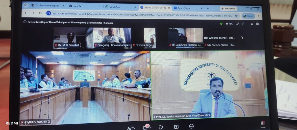Screenshot of a video meeting with several participants on screen.